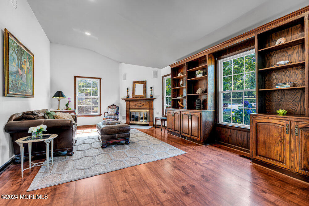 9 Comanche Drive Middletown, NJ 07716 - Photo 13 of 69 a living room with furniture and a wooden floor