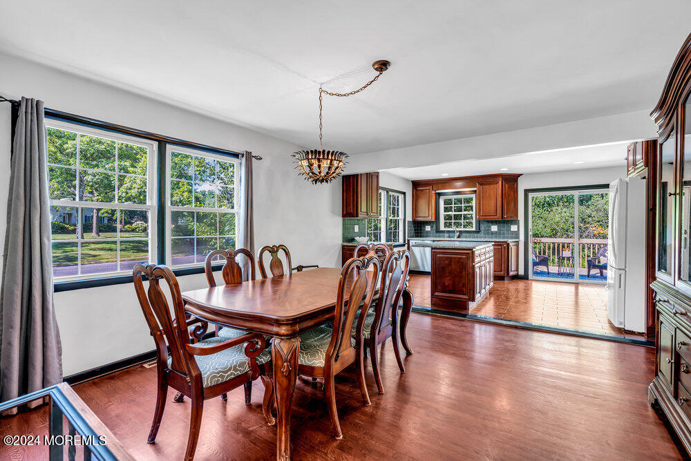 9 Comanche Drive Middletown, NJ 07716 - Photo 16 of 69 a dining room with furniture window and wooden floor