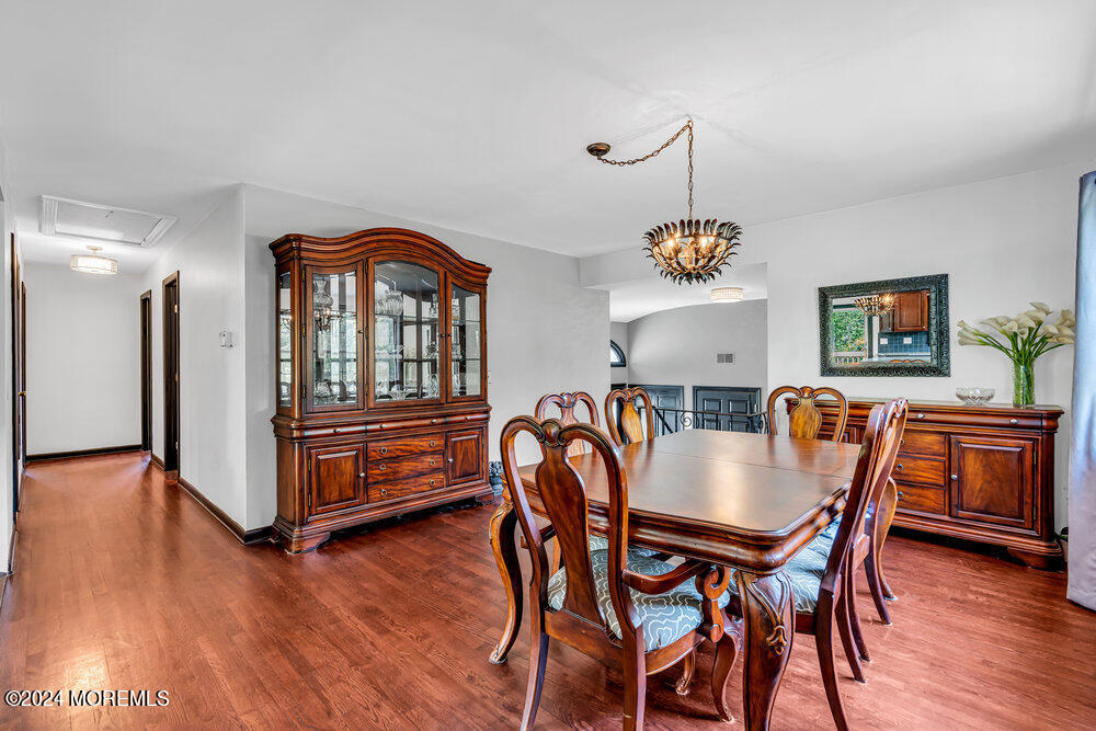 9 Comanche Drive Middletown, NJ 07716 - Photo 18 of 69 a dining room with furniture and wooden floor