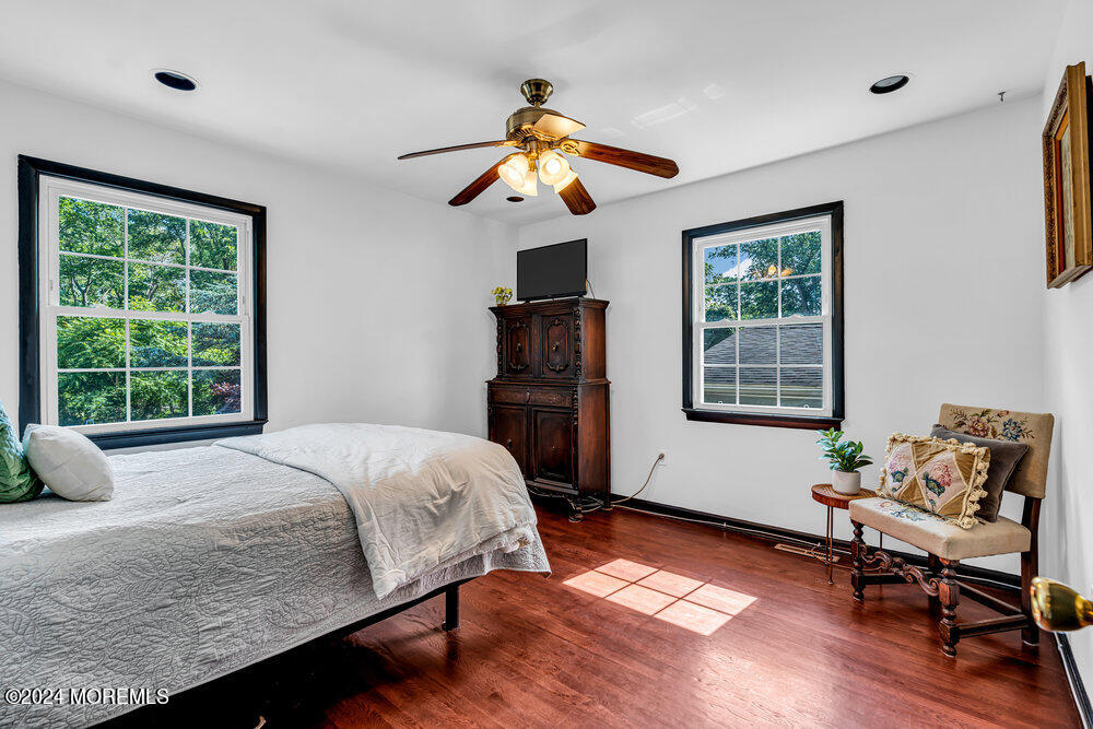 9 Comanche Drive Middletown, NJ 07716 - Photo 30 of 69 a bedroom with a bed and a window