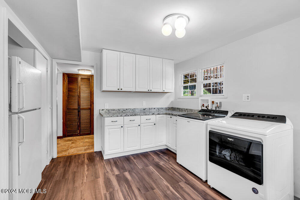 9 Comanche Drive Middletown, NJ 07716 - Photo 49 of 69 a kitchen with a stove oven and sink