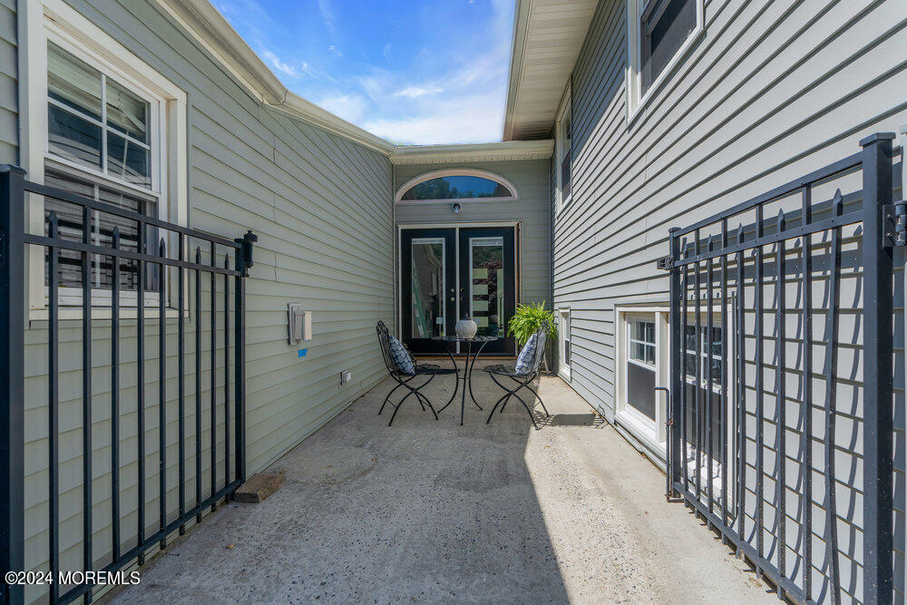9 Comanche Drive Middletown, NJ 07716 - Photo 51 of 69 a view of a house with backyard and sitting area