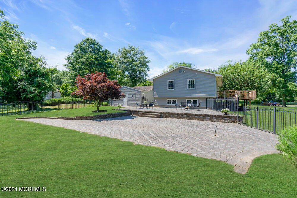 9 Comanche Drive Middletown, NJ 07716 - Photo 56 of 69 a view of a house with a yard