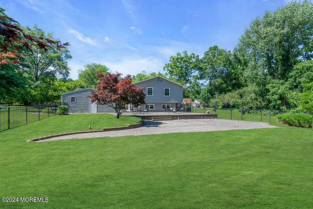 9 Comanche Drive Middletown, NJ 07716 - Photo 58 of 69 a front view of a house with garden