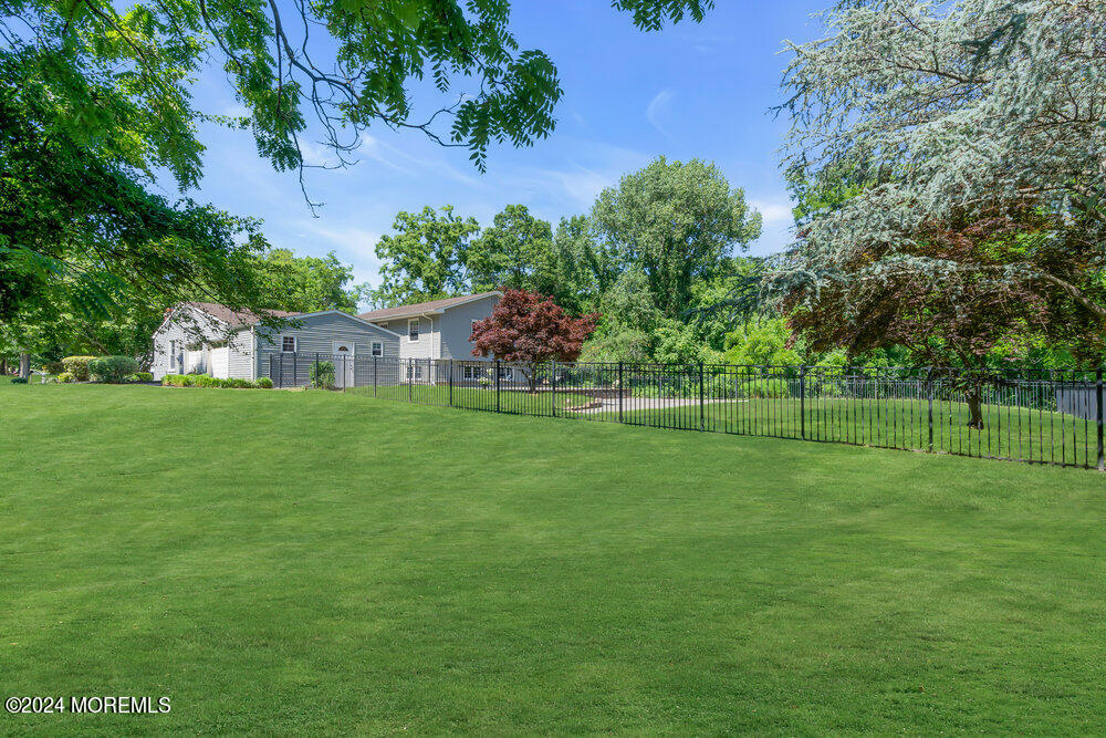 9 Comanche Drive Middletown, NJ 07716 - Photo 60 of 69 a view of a house with a big yard