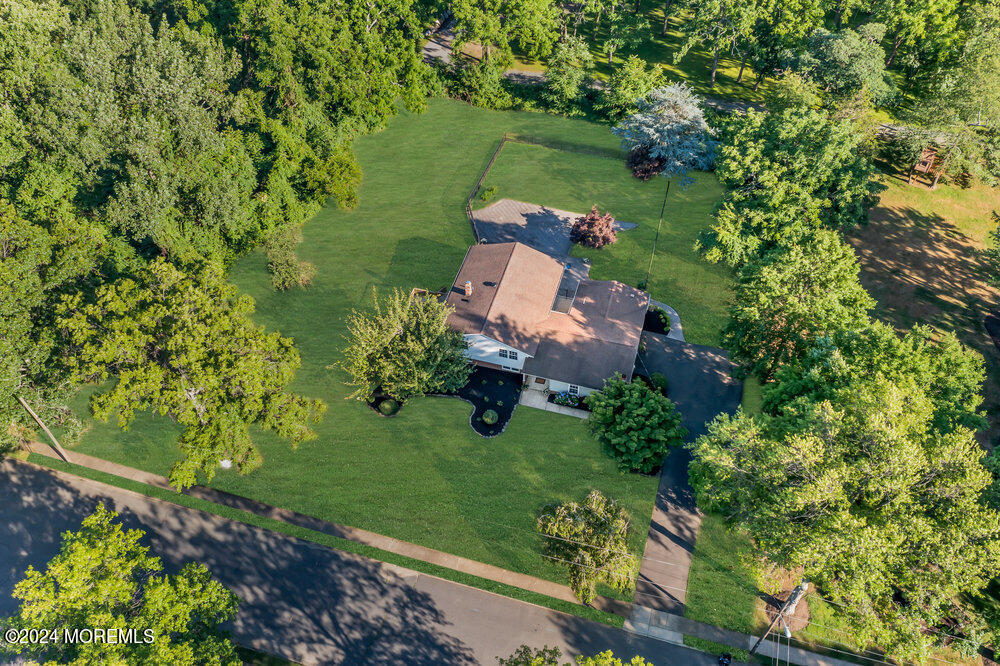 9 Comanche Drive Middletown, NJ 07716 - Photo 64 of 69 an aerial view of a house with a yard