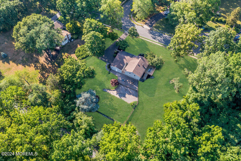 9 Comanche Drive Middletown, NJ 07716 - Photo 65 of 69 an aerial view of a house with a yard