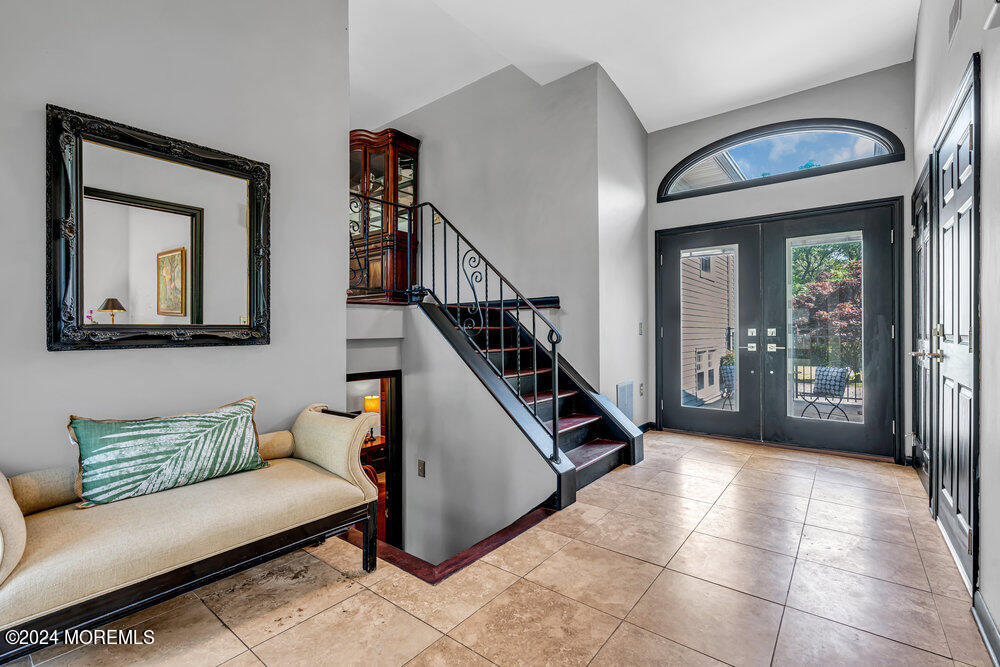 9 Comanche Drive Middletown, NJ 07716 - Photo 7 of 69 a living room with furniture and a painting