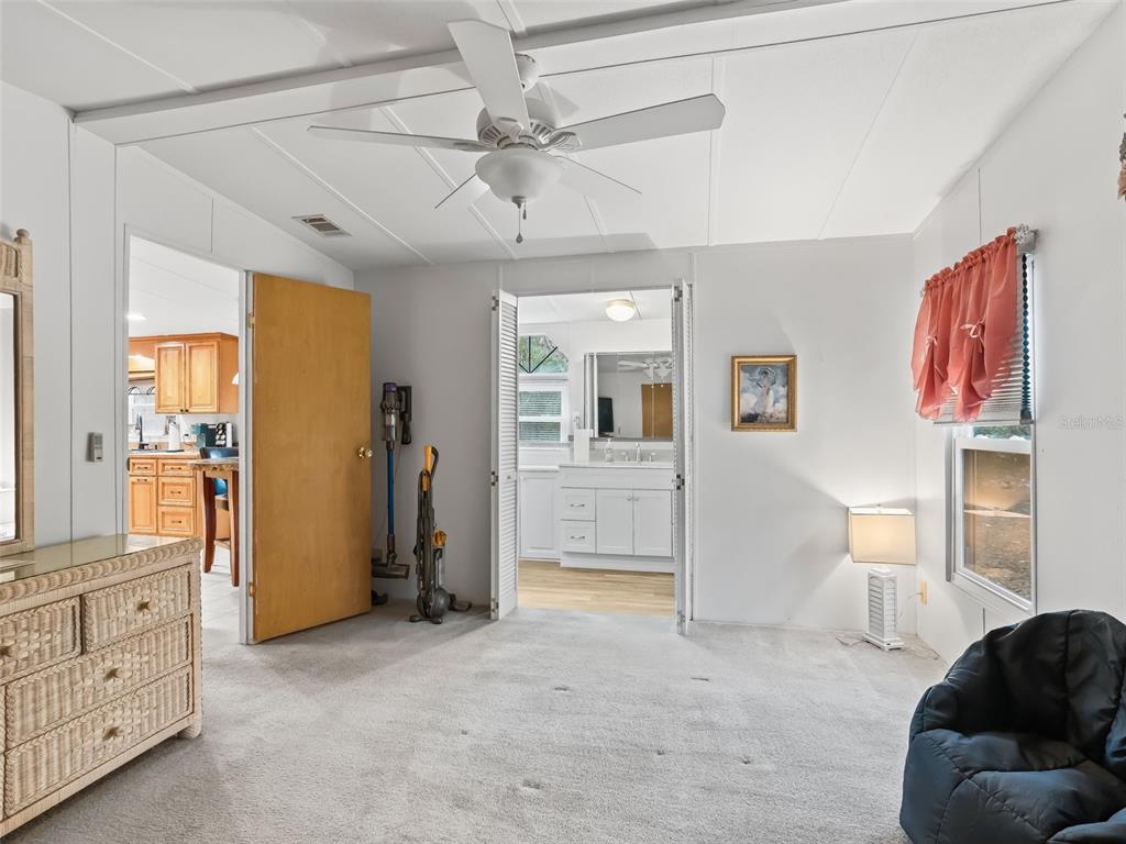 16160 Southeast 97th Terrace Road Summerfield, FL 34491 - Photo 16 of 39 a view of livingroom with furniture and ceiling fan