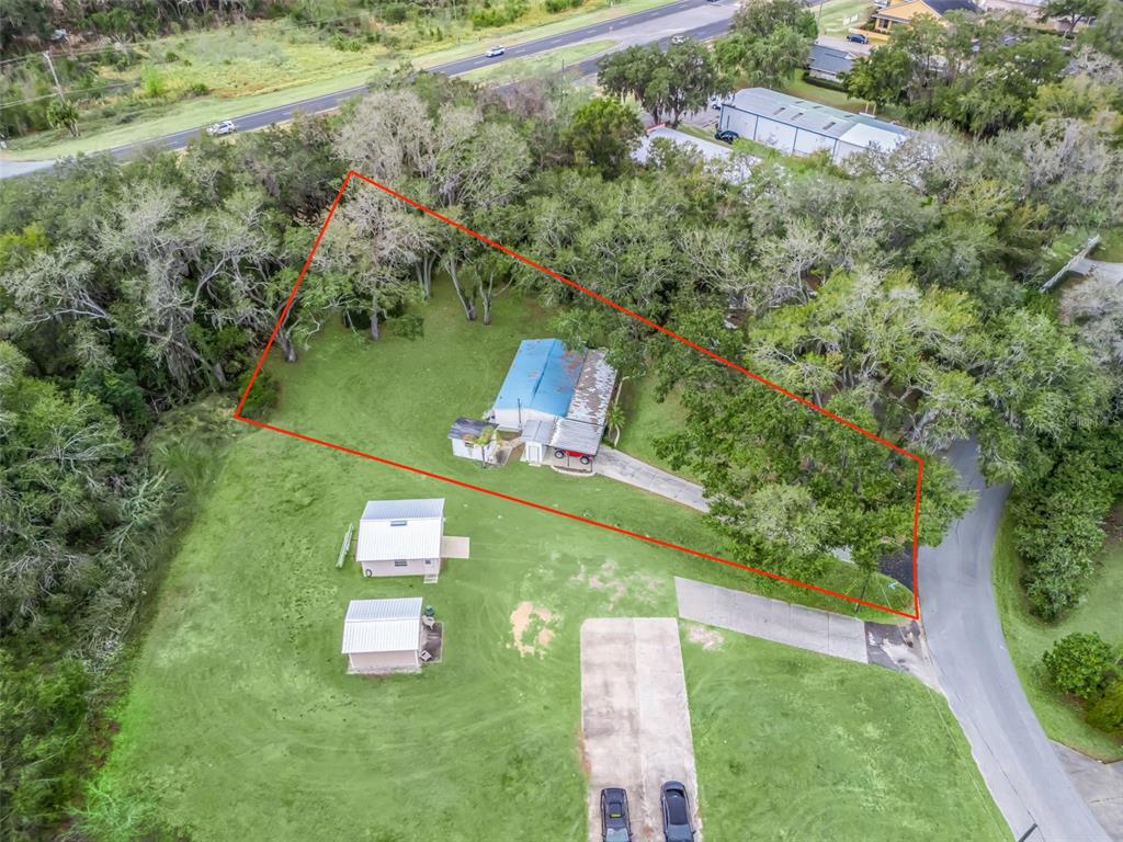 16160 Southeast 97th Terrace Road Summerfield, FL 34491 - Photo 28 of 39 an aerial view of a house with a yard