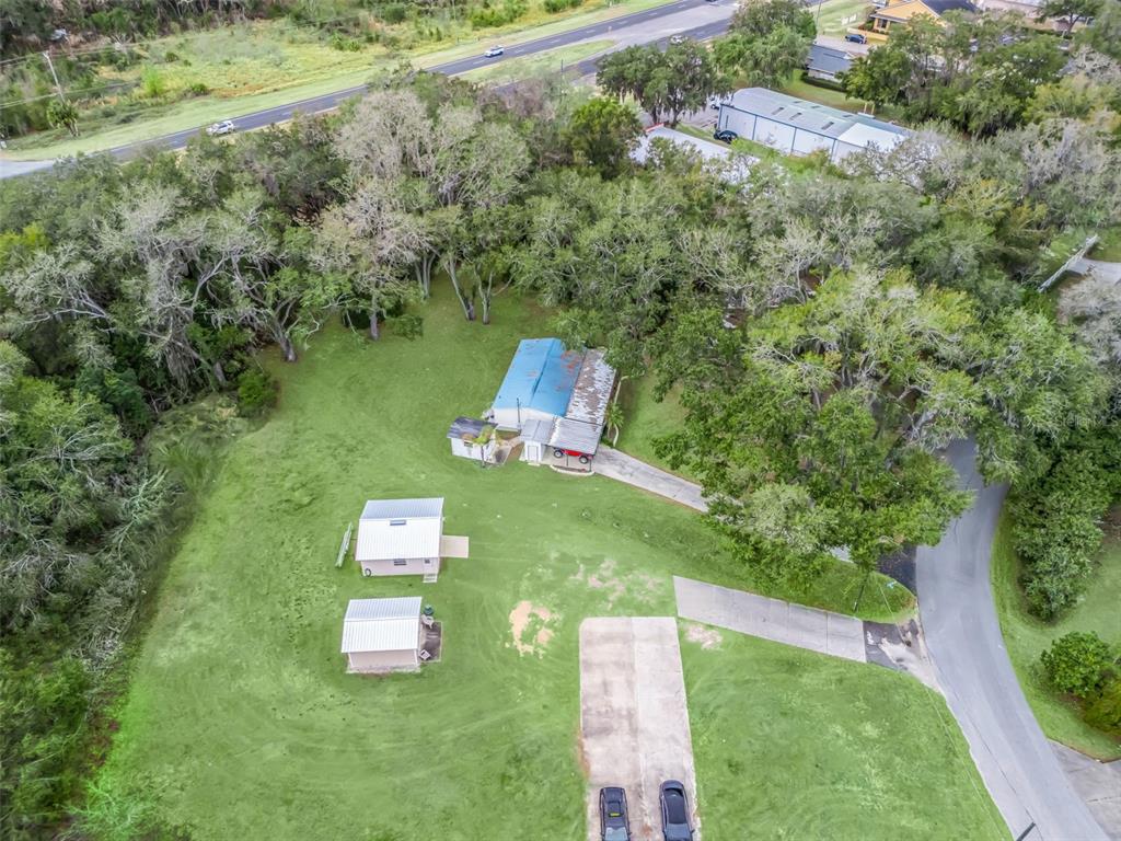 16160 Southeast 97th Terrace Road Summerfield, FL 34491 - Photo 33 of 39 a view of a house with a yard