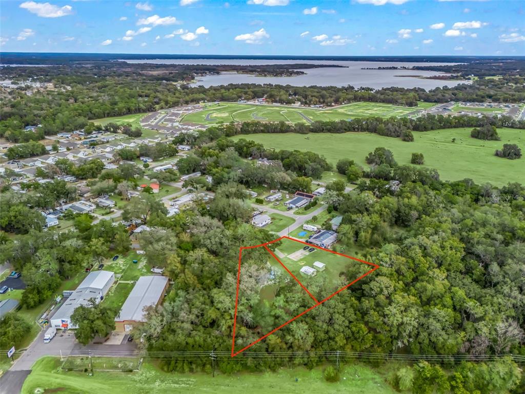 16160 Southeast 97th Terrace Road Summerfield, FL 34491 - Photo 39 of 39 a view of a garden with an outdoor space