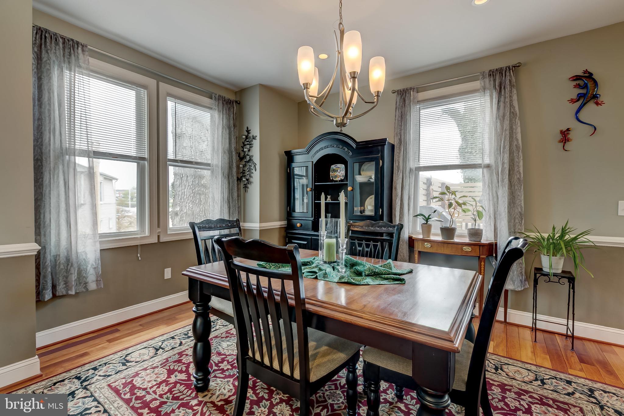 645 Aldershot Road Baltimore, MD 21229 - Photo 12 of 39 The dining room has 2 sides of windows.