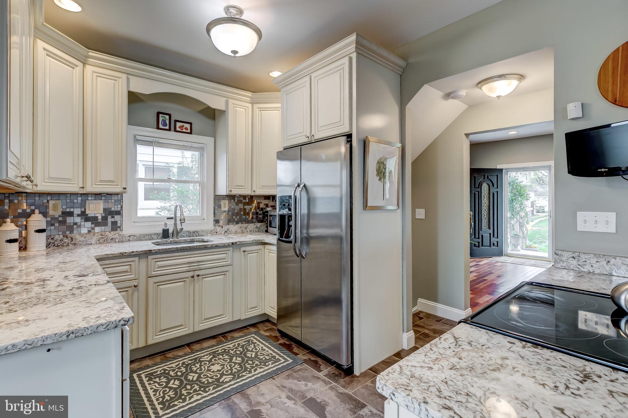 645 Aldershot Road Baltimore, MD 21229 - Photo 13 of 39 There are granite counters and SS appliances
