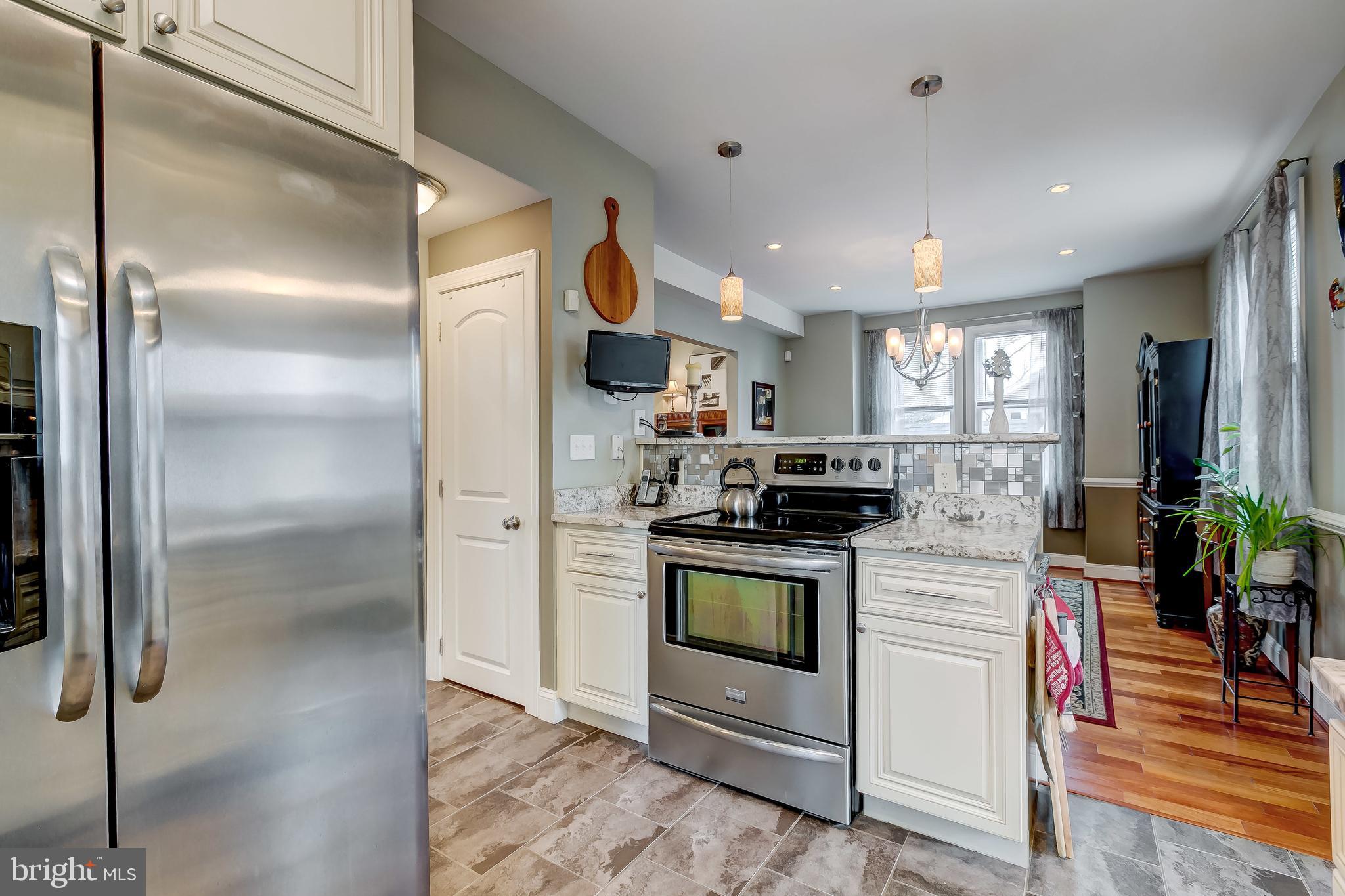 645 Aldershot Road Baltimore, MD 21229 - Photo 16 of 39 The kitchen and dining room are open concept.