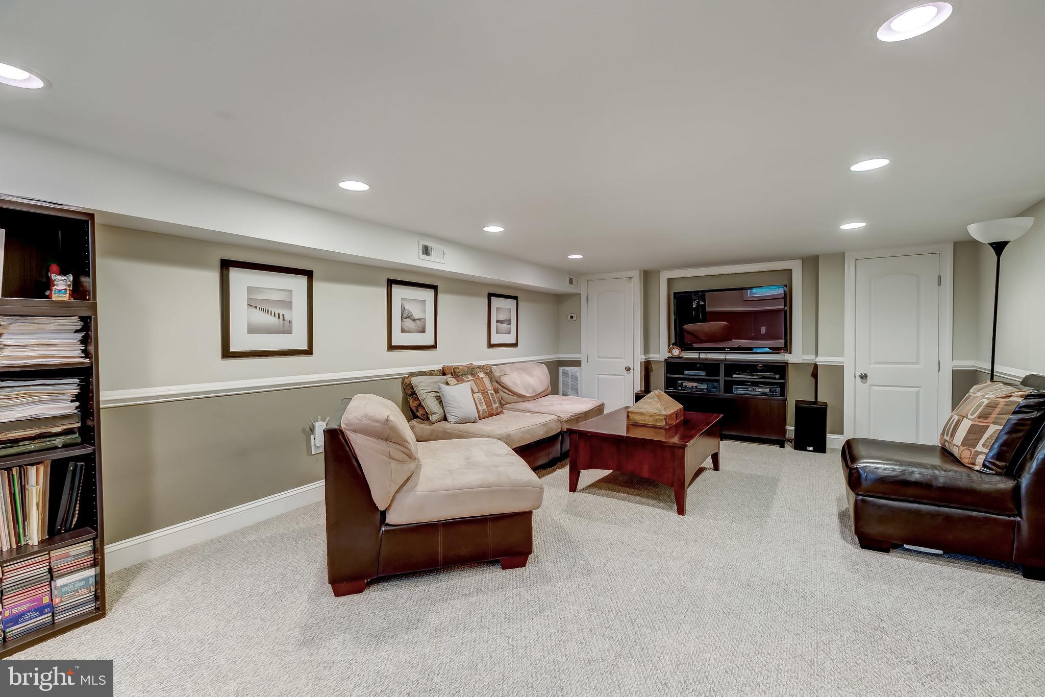 645 Aldershot Road Baltimore, MD 21229 - Photo 28 of 39 The lower level has this large media room.
