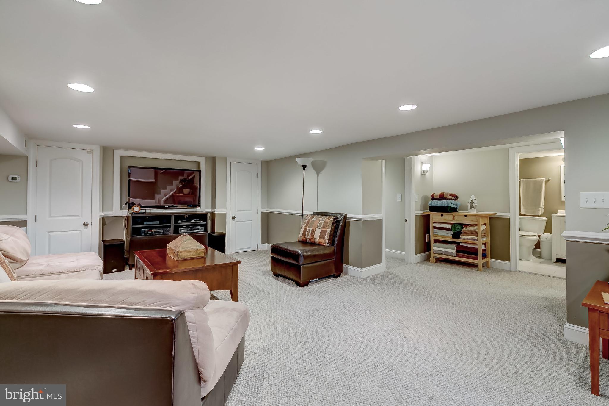 645 Aldershot Road Baltimore, MD 21229 - Photo 29 of 39 There are recessed lights in the media room.