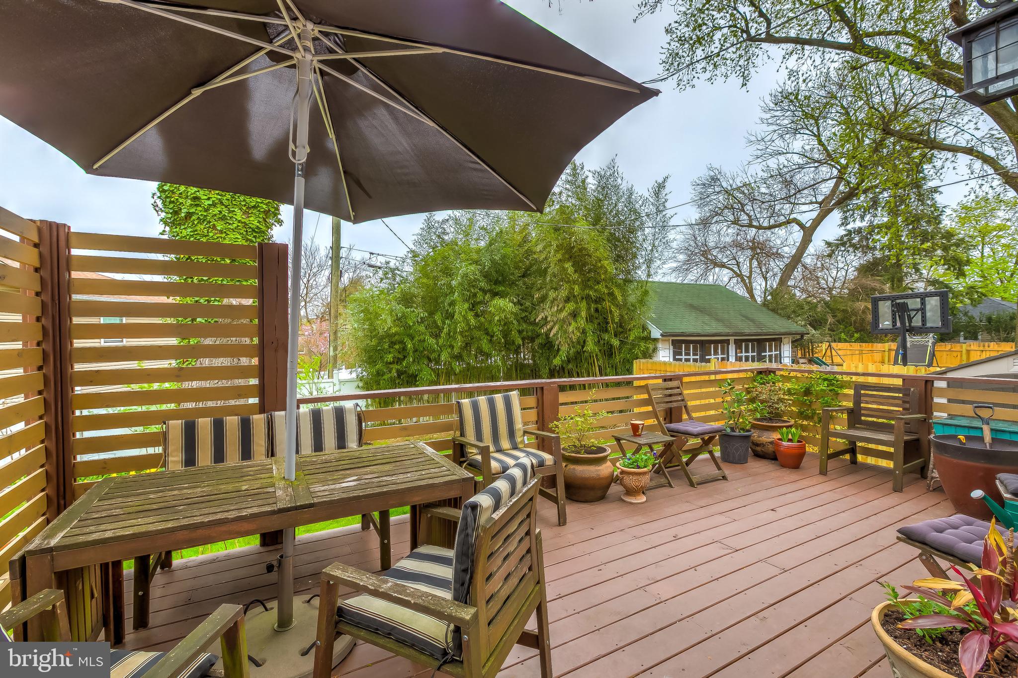 645 Aldershot Road Baltimore, MD 21229 - Photo 34 of 39 The lovely rear deck overlooks the garden.