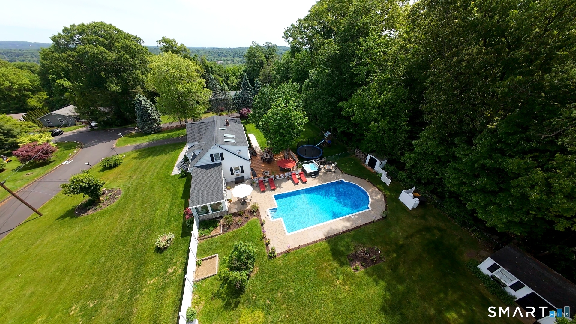13 Pleasant Rise Circle Brookfield, CT 06804 - Photo 10 of 40 an aerial view of a house with a garden and swimming pool