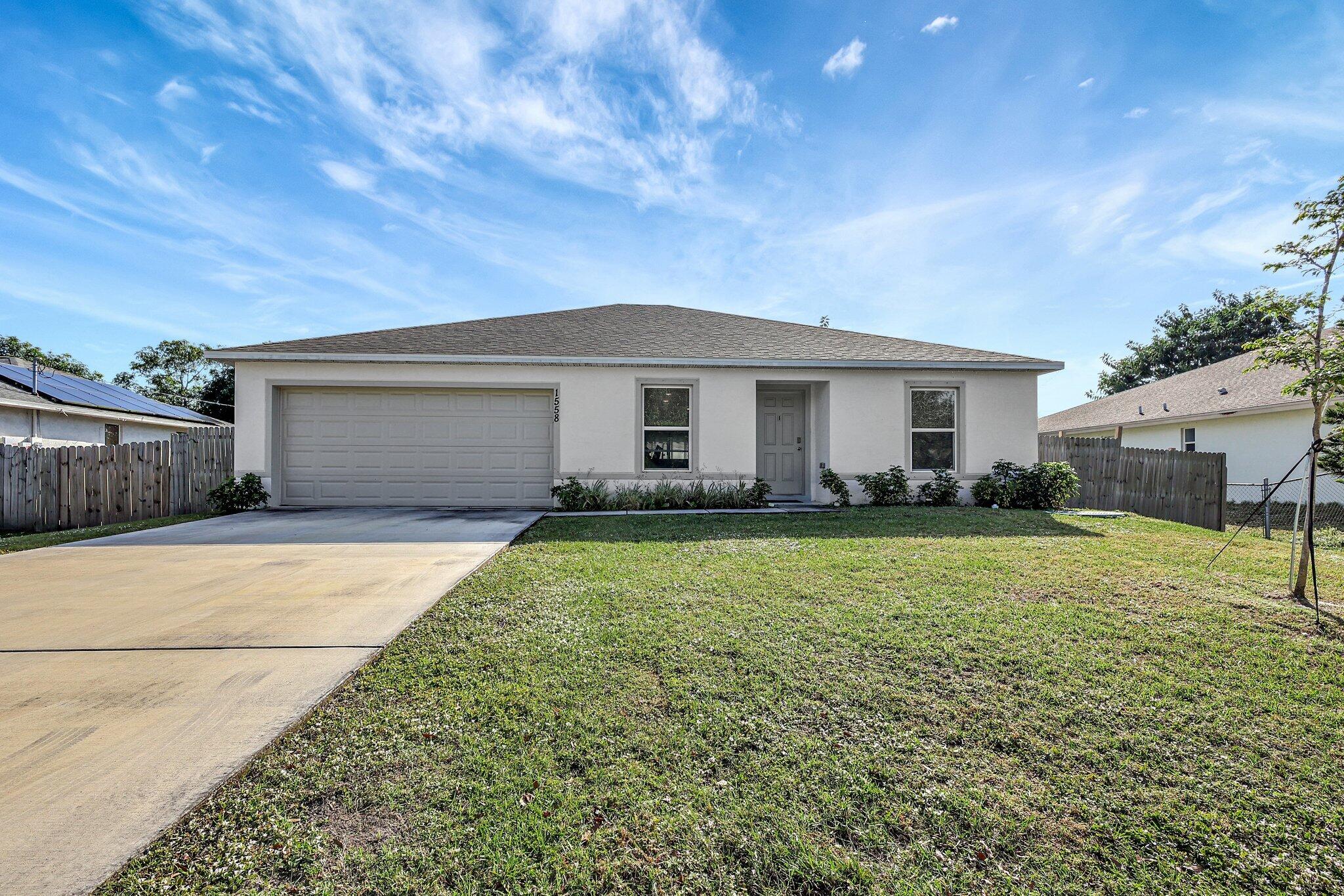 1558 Southwest Fresno Road Port St. Lucie, FL 34953 - Photo 1 of 39 1-web-or-mls-5P1A5857