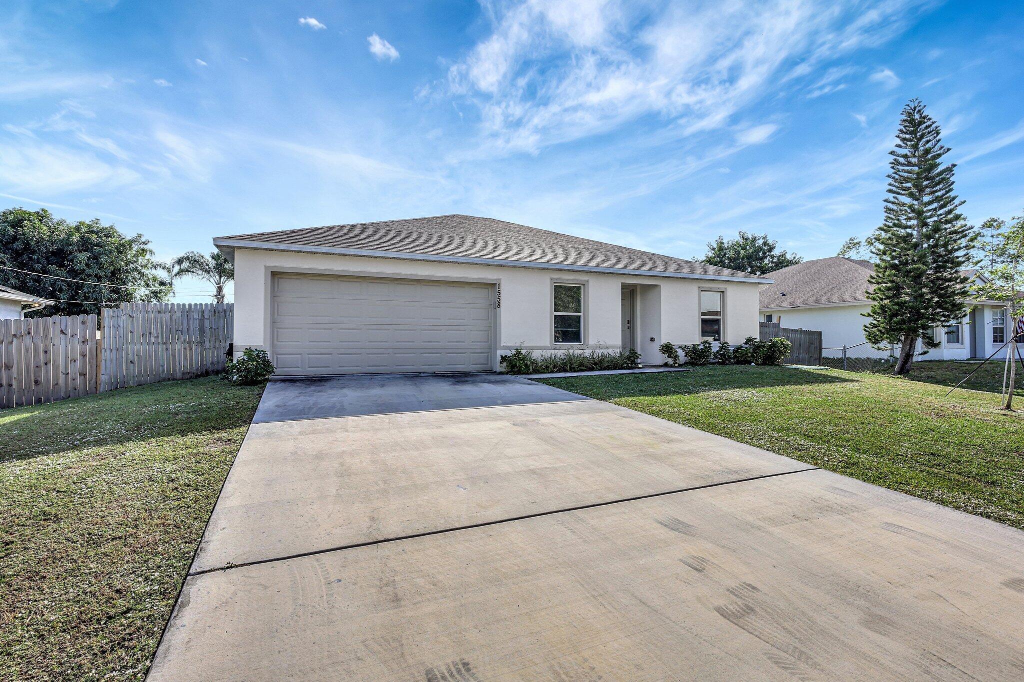 1558 Southwest Fresno Road Port St. Lucie, FL 34953 - Photo 2 of 39 2-web-or-mls-5P1A5852
