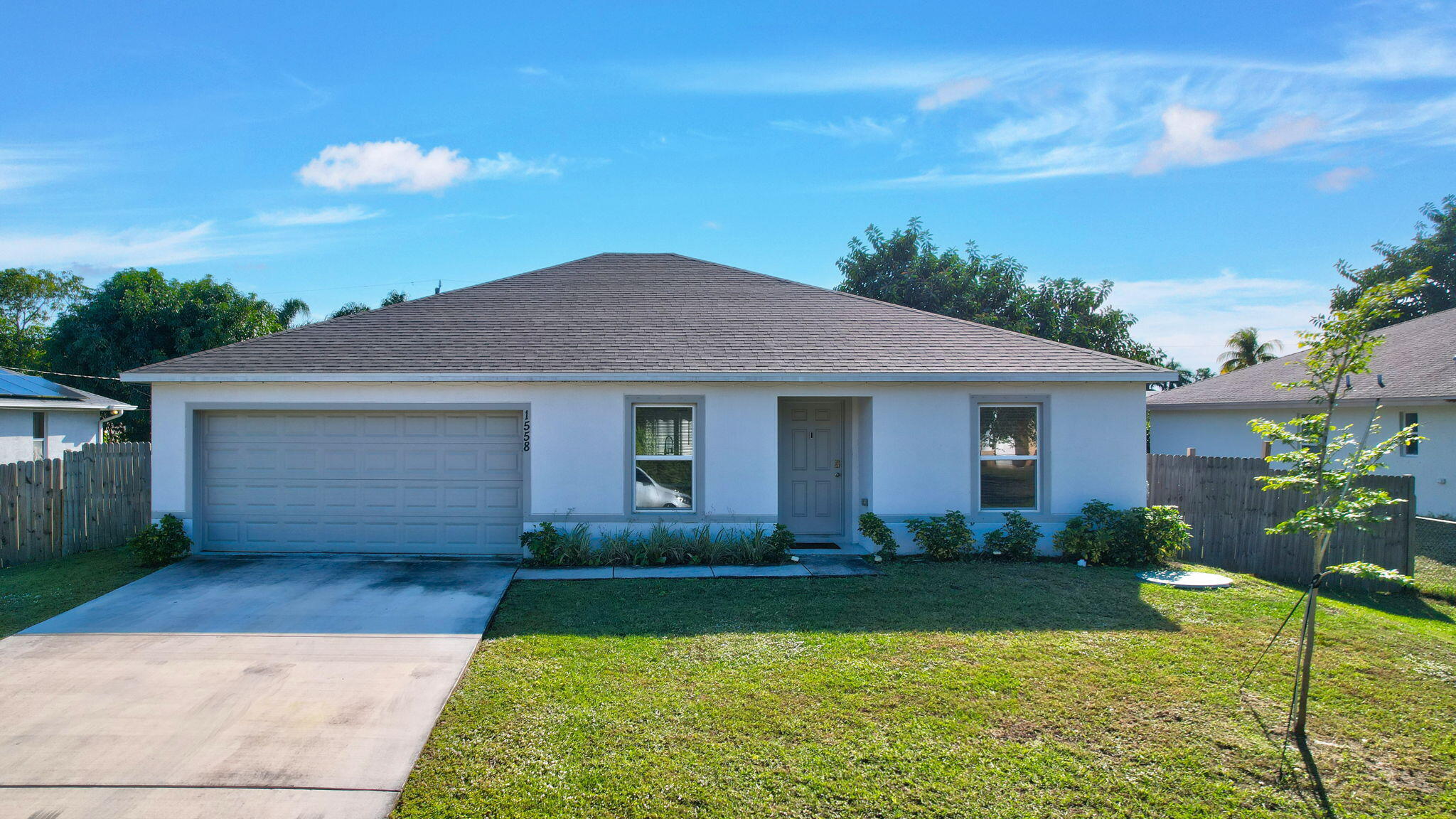 1558 Southwest Fresno Road Port St. Lucie, FL 34953 - Photo 32 of 39 38-web-or-mls-DJI_0402_3_4_5_6
