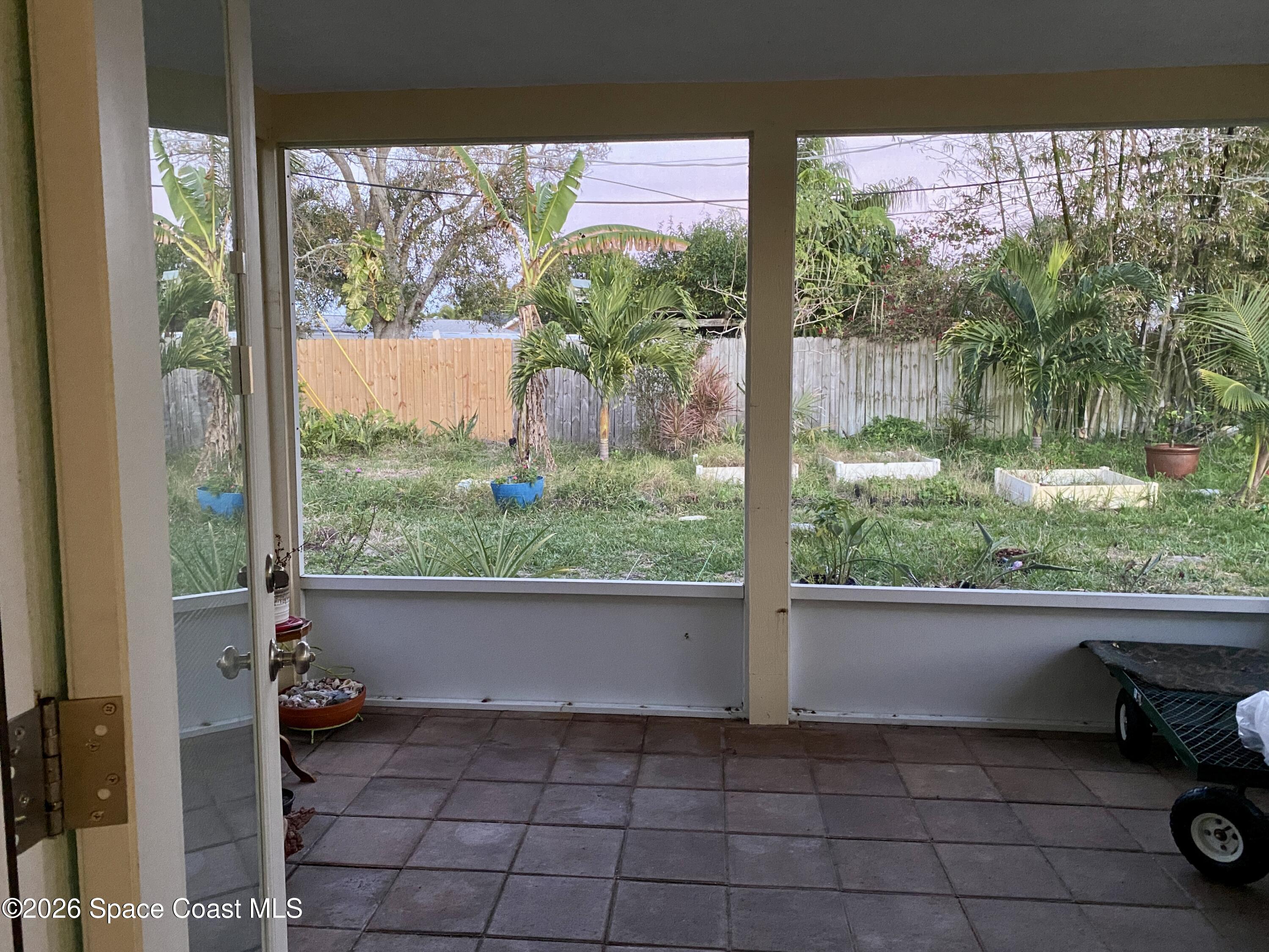 485 Temple Street Satellite Beach, FL 32937 - Photo 5 of 25 Screened In Porch
