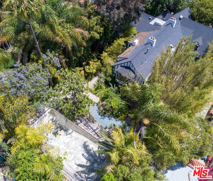 613 North Arden Drive Beverly Hills, CA 90210 - Photo 19 of 25 a view of outside garden with plants and large trees