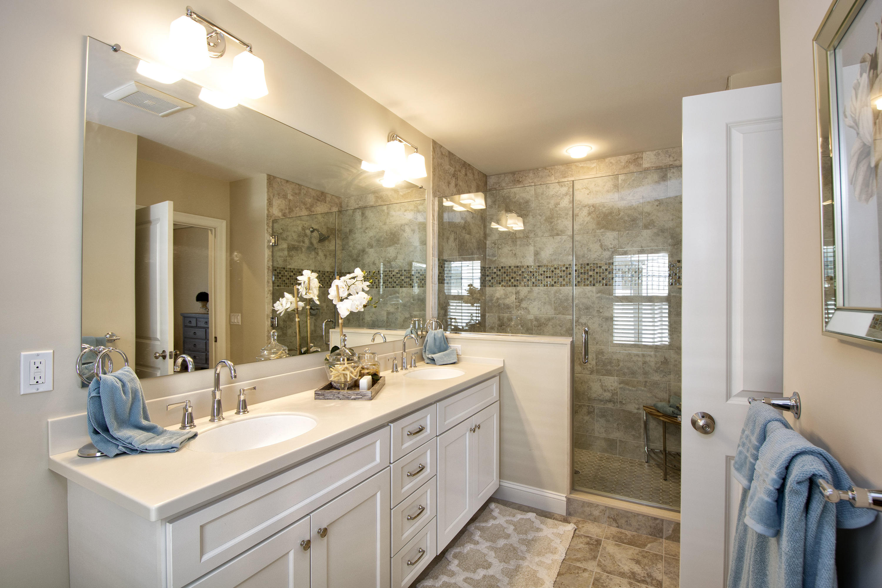 67 Cobblestone Circle Mashpee, MA 02649 - Photo 12 of 38 a bathroom with a double vanity sink mirror and double