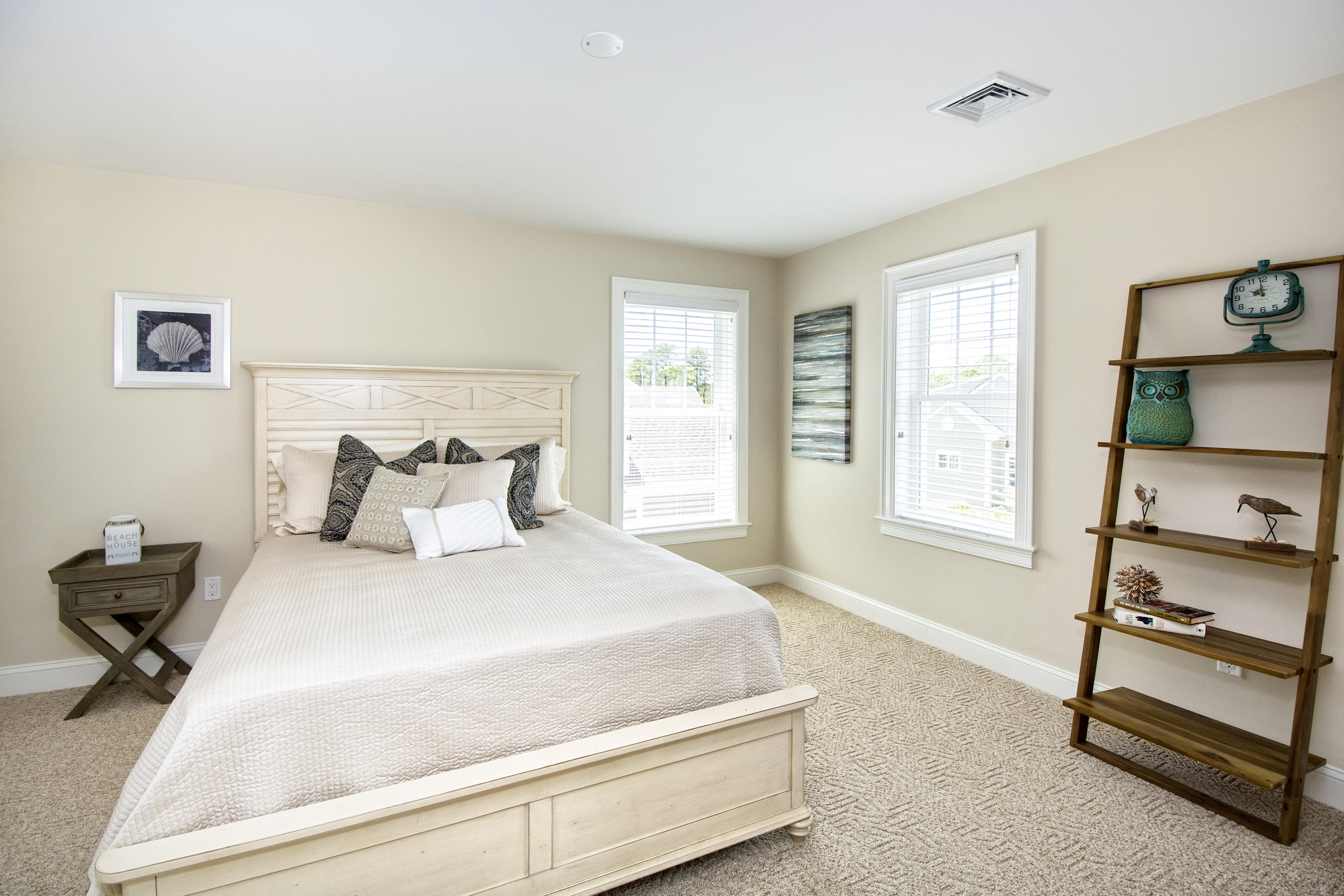 67 Cobblestone Circle Mashpee, MA 02649 - Photo 16 of 38 a bedroom with a bed and a window