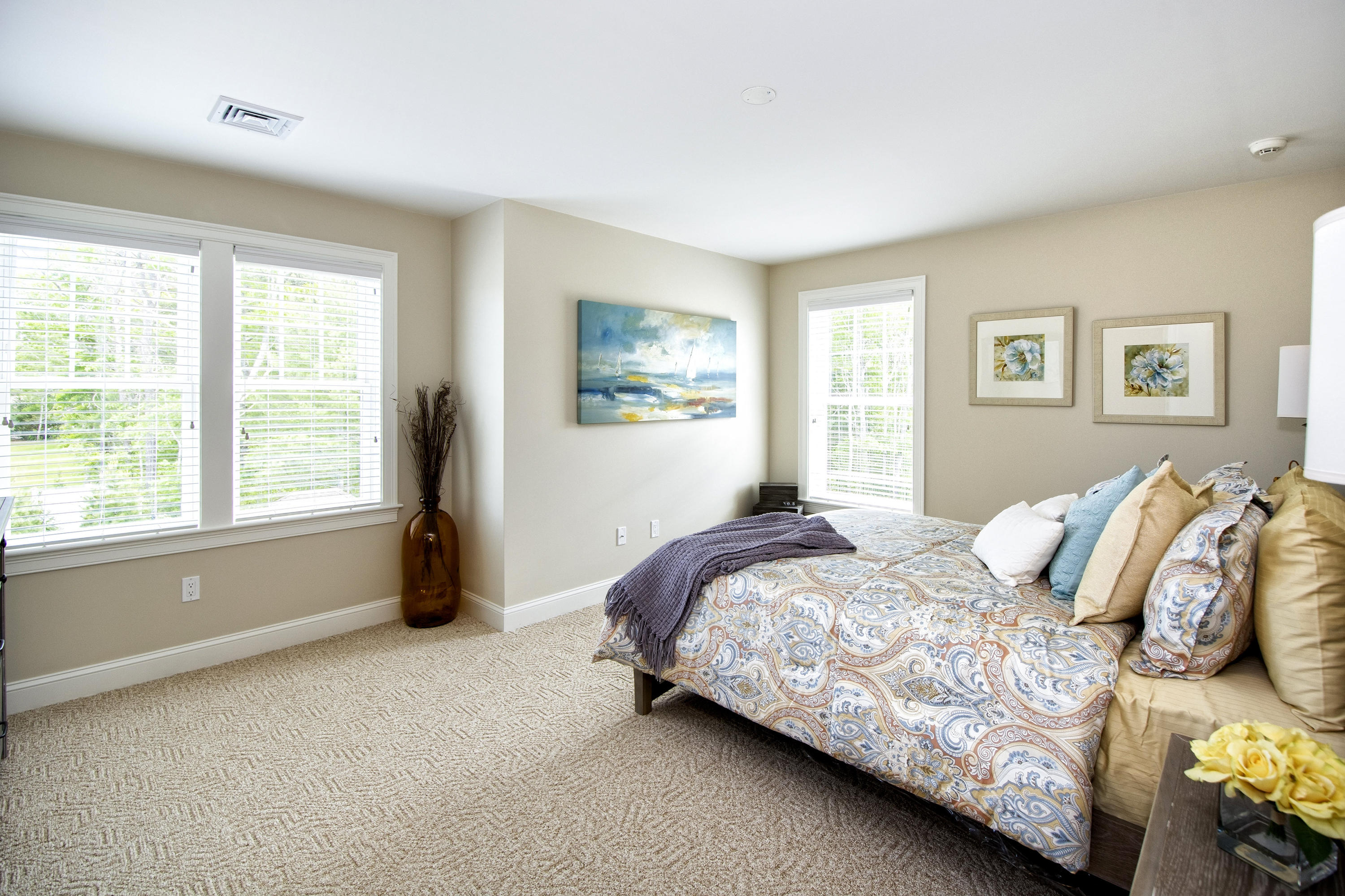 67 Cobblestone Circle Mashpee, MA 02649 - Photo 17 of 38 a bedroom with a bed and window