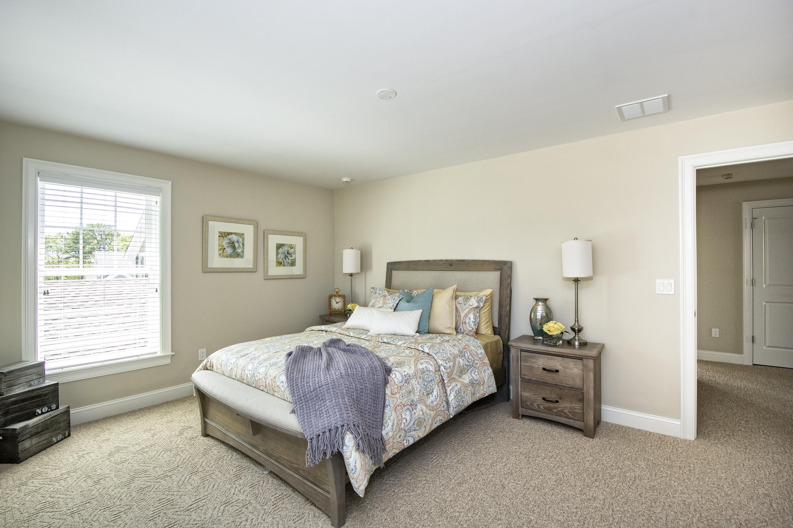 67 Cobblestone Circle Mashpee, MA 02649 - Photo 18 of 38 a bedroom with a bed and a window