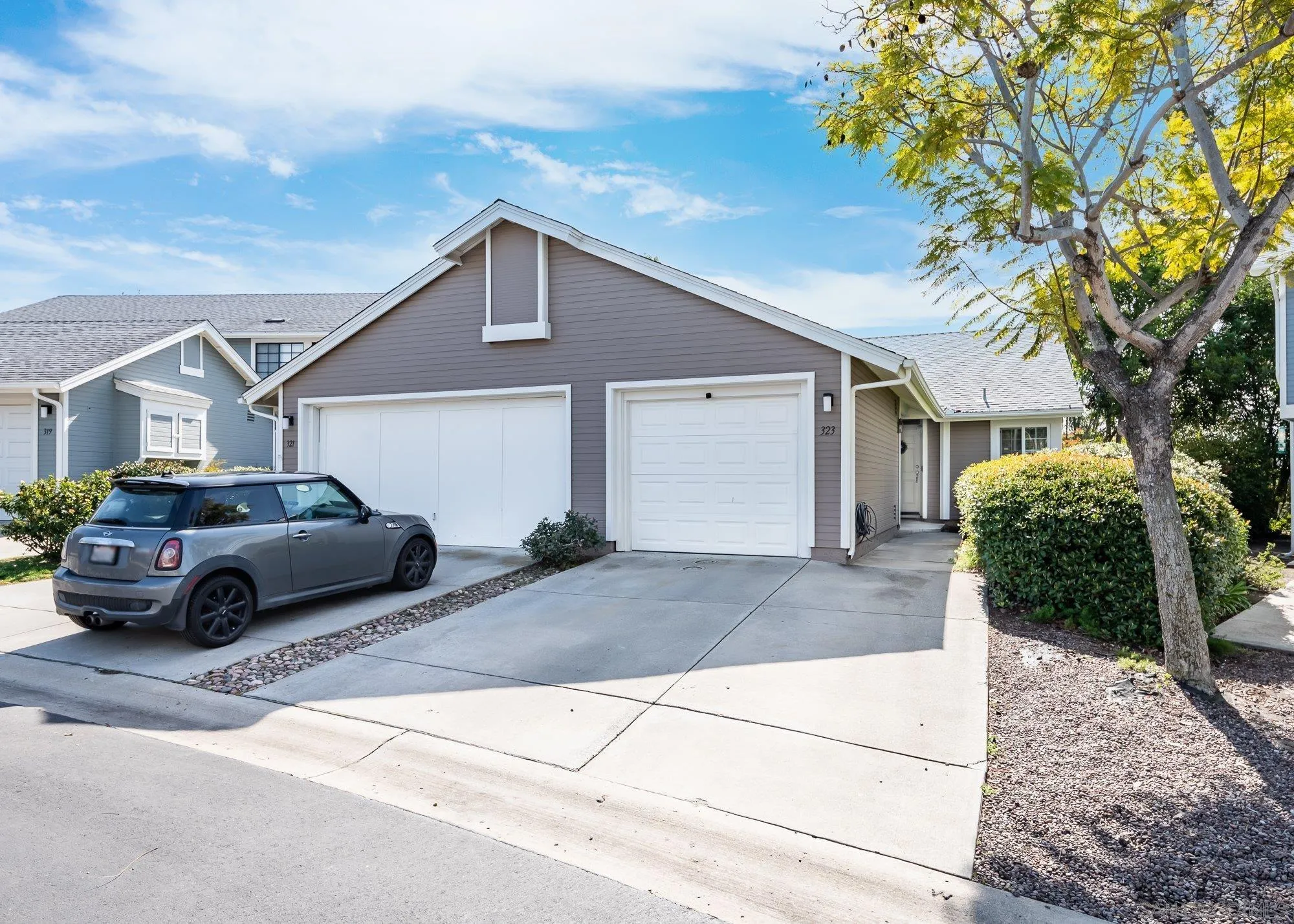 323 Windjammer Circle Chula Vista, CA 91910 - Photo 1 of 27 a car parked in front of white house