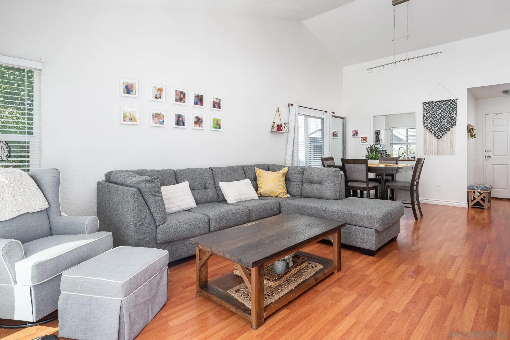 323 Windjammer Circle Chula Vista, CA 91910 - Photo 11 of 27 a living room with furniture and wooden floor