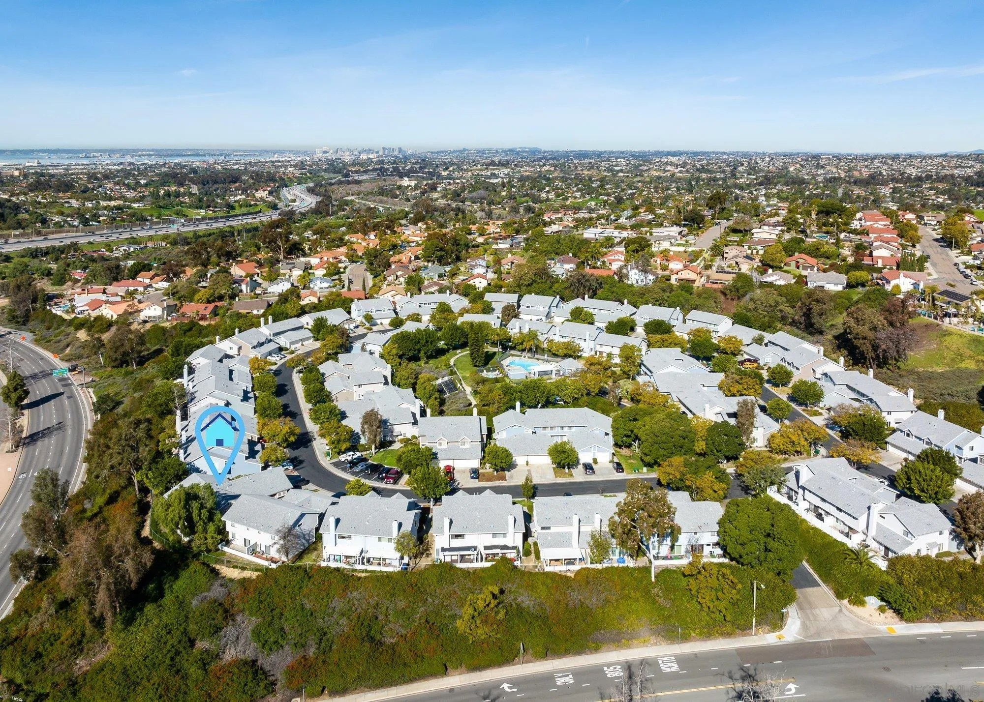 323 Windjammer Circle Chula Vista, CA 91910 - Photo 2 of 27 an aerial view of residential houses with outdoor space