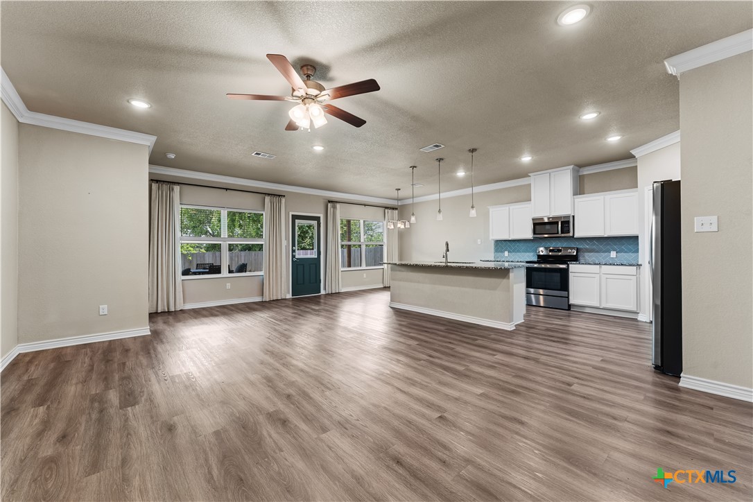 8321 Alabama Avenue Temple, TX 76502 - Photo 17 of 42 Living Room Open to Kitchen