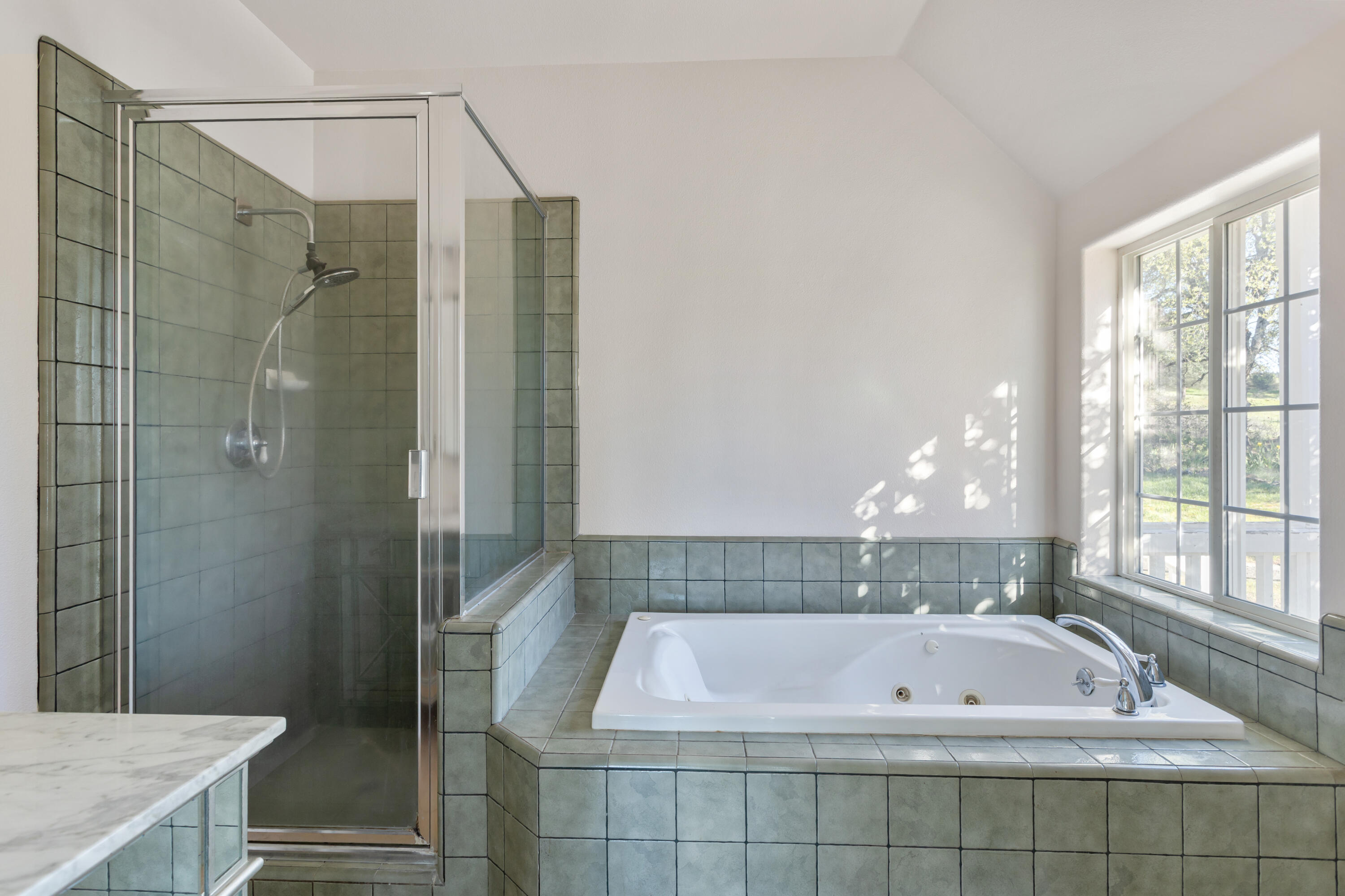 32211 Rock Creek Road Manton, CA 96059 - Photo 14 of 35 a bath tub sitting next to a bathroom sink