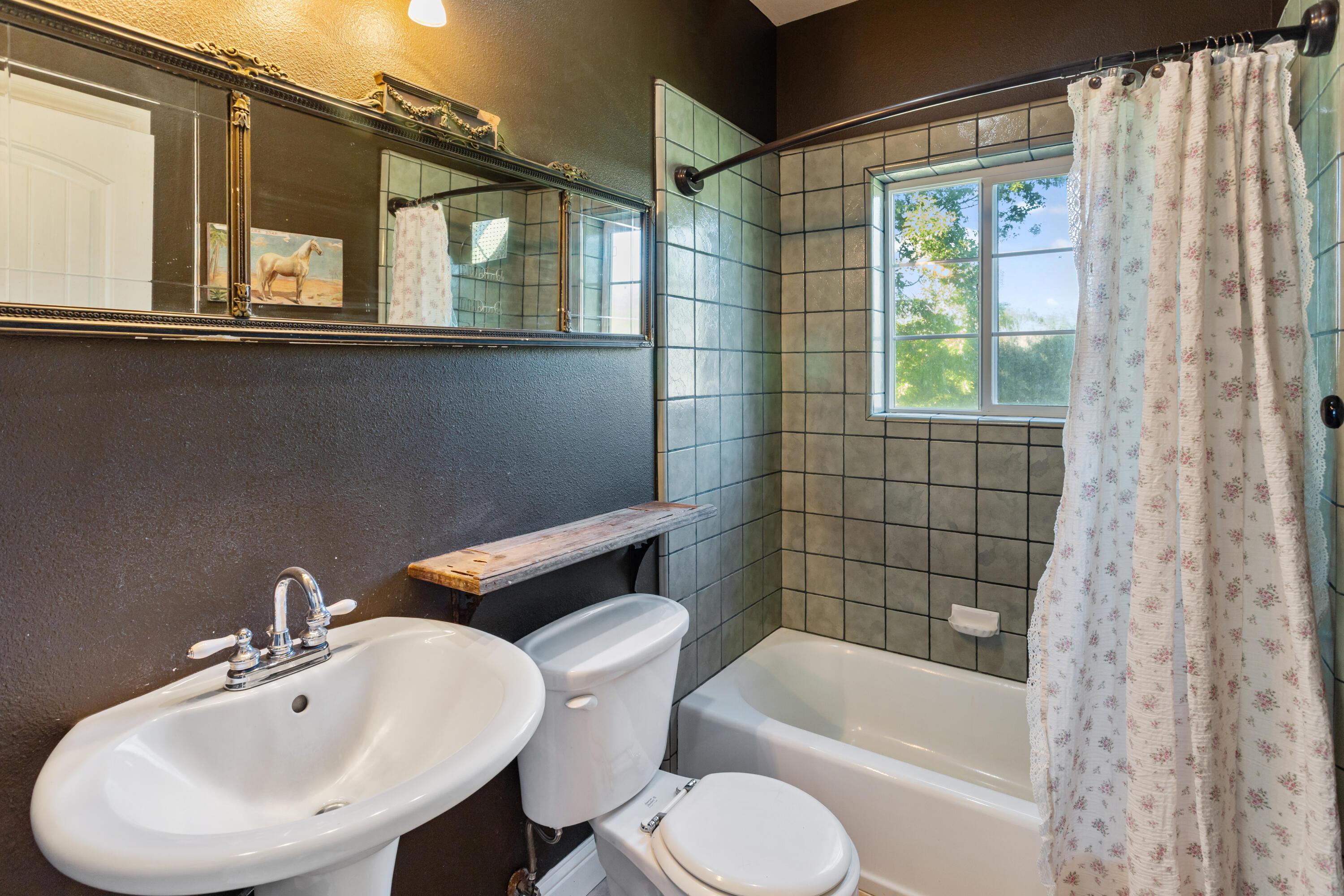 32211 Rock Creek Road Manton, CA 96059 - Photo 19 of 35 a bathroom with a sink a toilet and bathtub