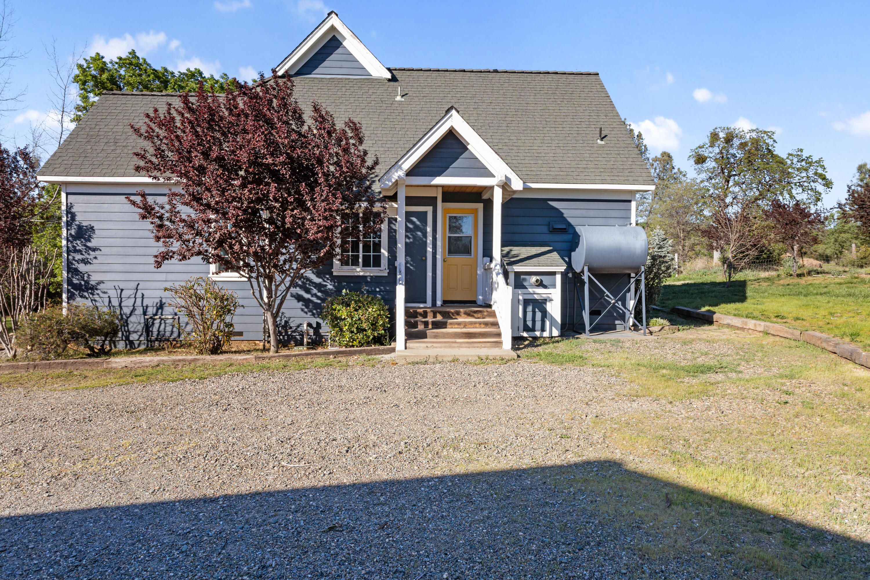 32211 Rock Creek Road Manton, CA 96059 - Photo 30 of 35 front view of a house with a yard