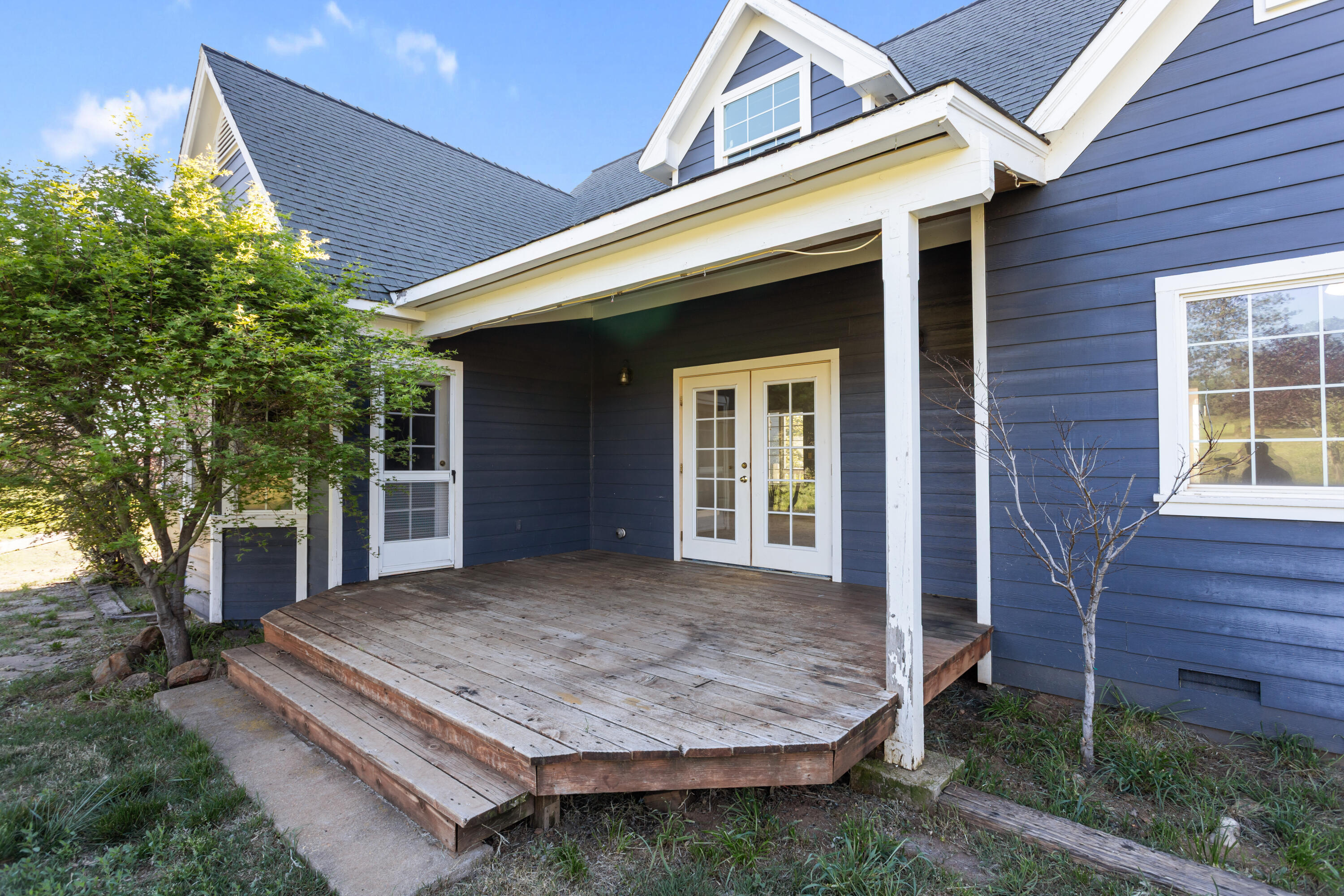 32211 Rock Creek Road Manton, CA 96059 - Photo 32 of 35 a view of house with backyard and outdoor seating