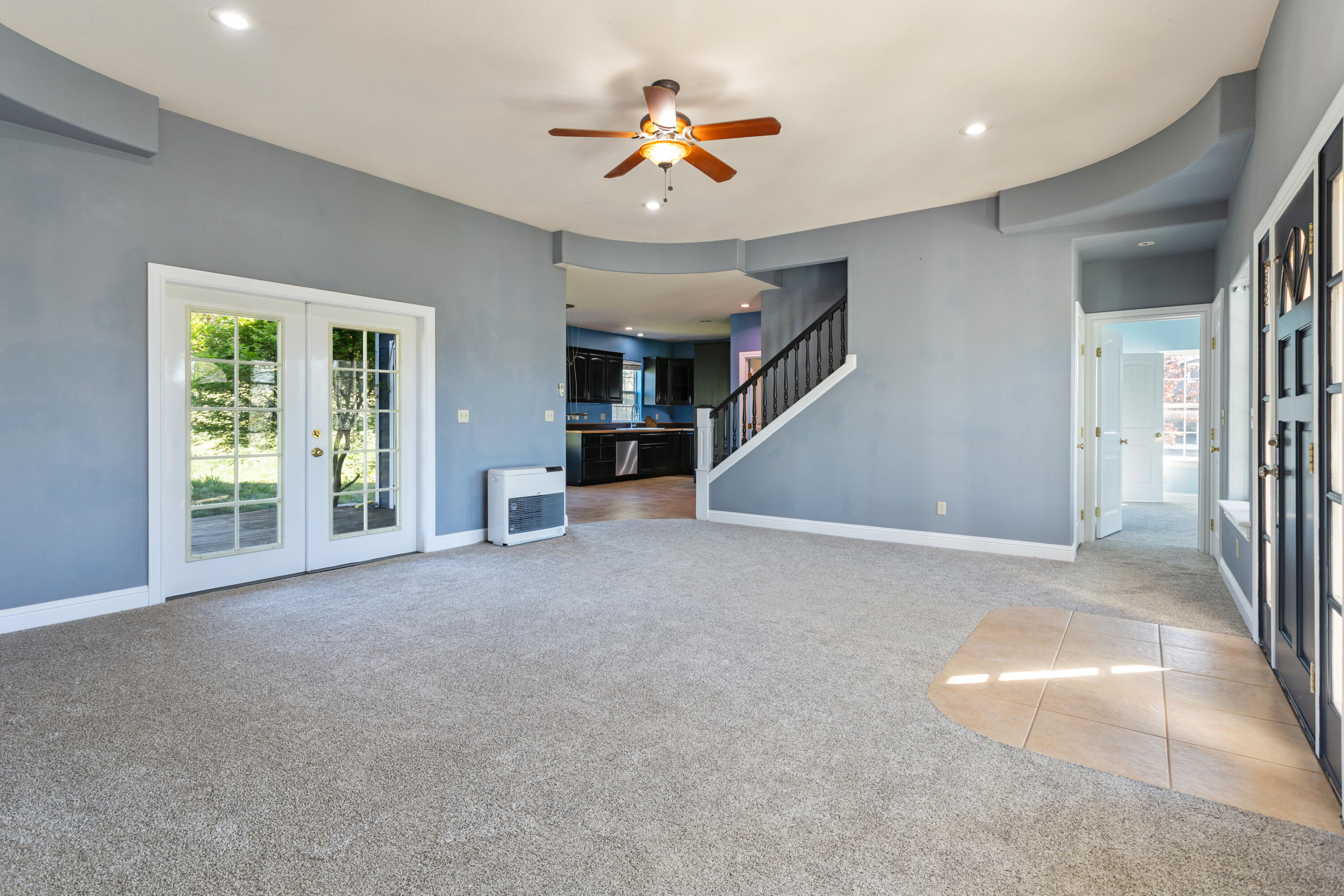 32211 Rock Creek Road Manton, CA 96059 - Photo 6 of 35 a view of a livingroom with furniture ceiling fan and window