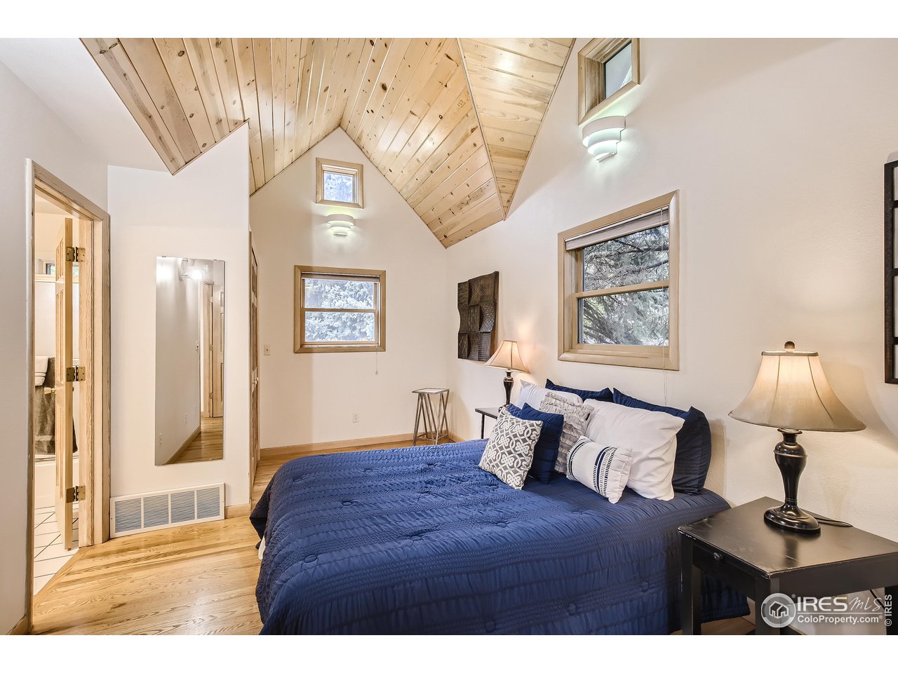 520 Mapleton Avenue Boulder, CO 80302 - Photo 12 of 24 a living room with furniture and a window