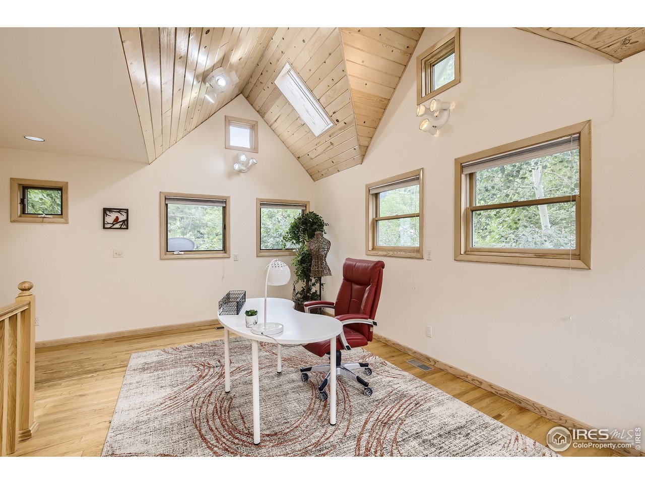 520 Mapleton Avenue Boulder, CO 80302 - Photo 15 of 24 a workspace with wooden floor and a window