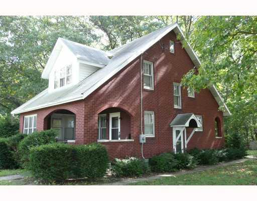 Exterior Front. All brick 3 bedroom cape cod in the country on 3.25 acres