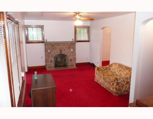 1062 Herman Road Butler, PA 16002 - Photo 4 of 18 Living Room. Stone wood burning fireplace in the livingroom