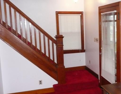 1062 Herman Road Butler, PA 16002 - Photo 8 of 18 Living Room. Note how well cared for the bannister & wood trim around windows & doors have been maintained
