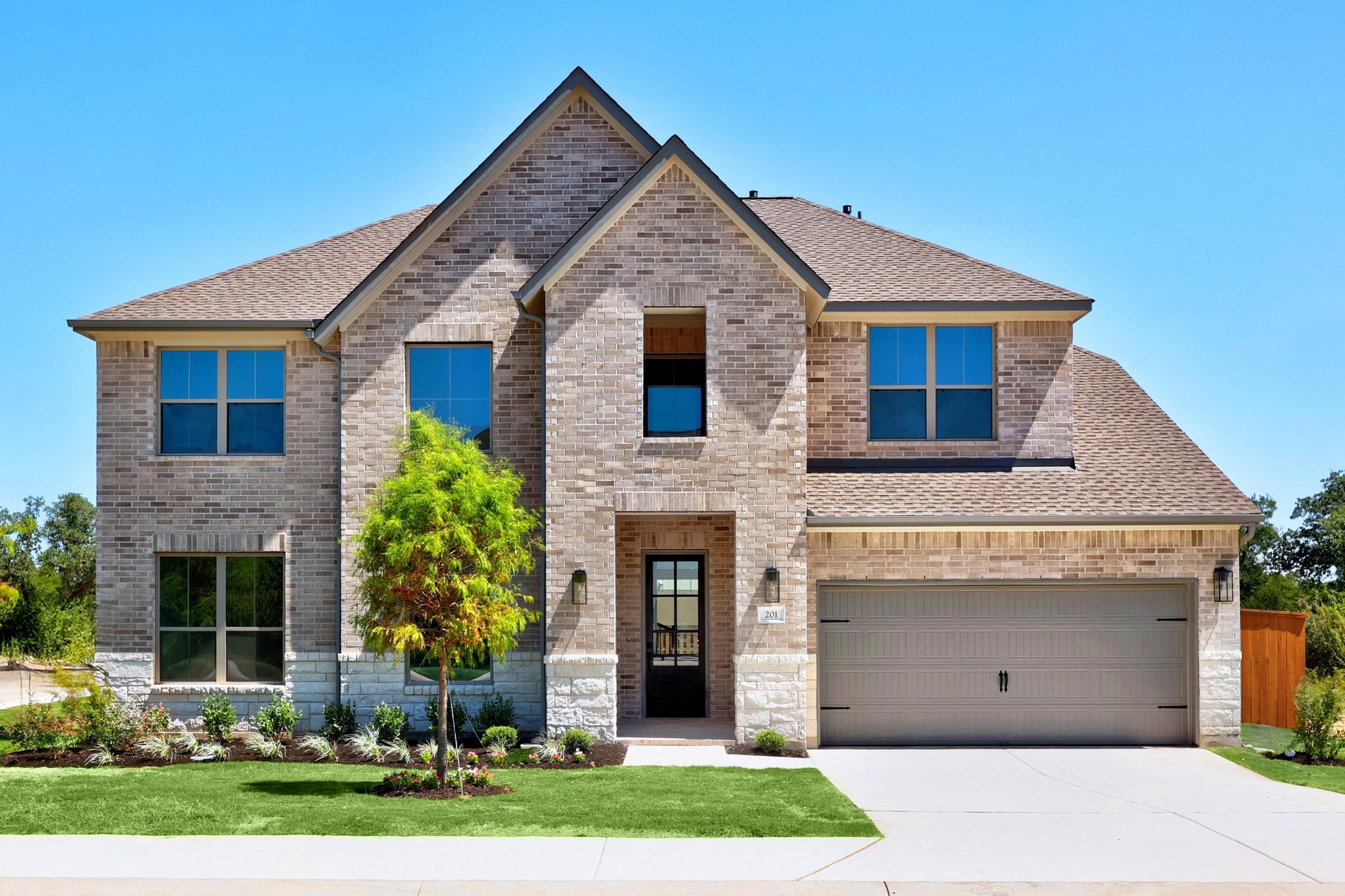 201 Buckaroo Drive Georgetown, TX 78633 - Photo 1 of 36 Move in Ready. Westin Homes *New Construction* Cooper Plan. Grass is digitally enhanced.