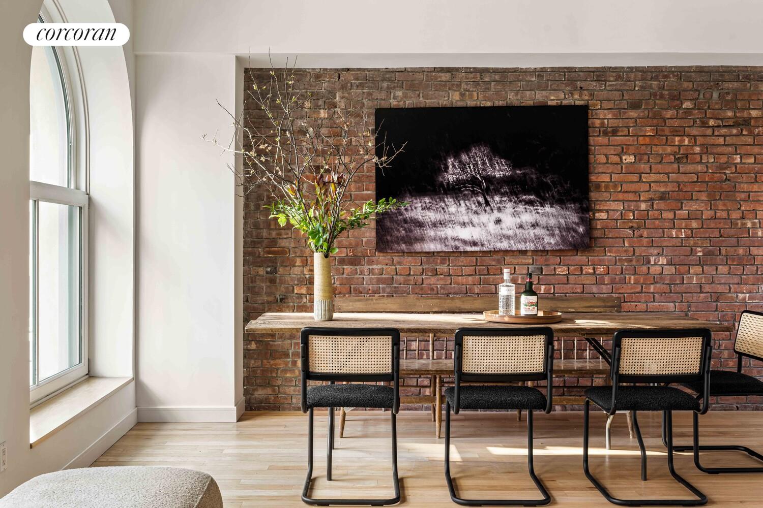 83 Walker Street, Unit 4 Manhattan, NY 10013 - Photo 3 of 21 a living room with furniture and a fireplace