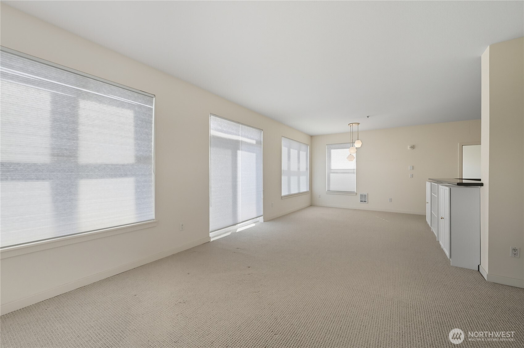303 23rd Avenue South, Unit 602 Seattle, WA 98144 - Photo 14 of 26 a view of empty room with a fireplace
