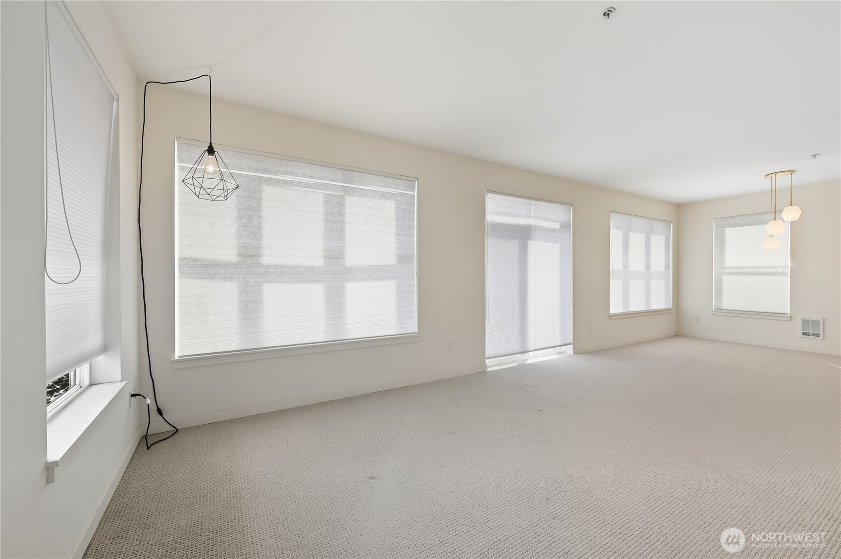 303 23rd Avenue South, Unit 602 Seattle, WA 98144 - Photo 15 of 26 a view of an empty room with a window